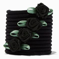 Claire's Black Rose and Mint Green Ribbon Hair Ties, 12-Pack is a versatile and stylish accessory set designed to add a touch of elegance to your everyday hairstyles. This pack includes 12 hair ties in a beautiful combination of black rose and mint green ribbon designs. These hair ties are perfect for creating chic ponytails, braids, or buns while being gentle on your hair. Whether youre dressing up for a special occasion or adding flair to your daily look, these hair ties are a must-have additi Queen Vampire, Ribbon Leaves, Ponytails Braids, Chic Ponytail, Ribbon Hair Ties, Soft Goth, Bday Wishlist, Piercing Kit, Bracelet Inspo