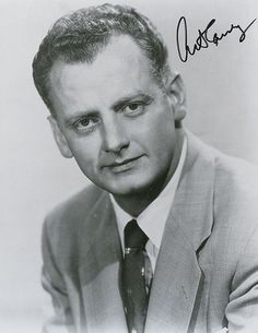 an old black and white photo of a man in a suit