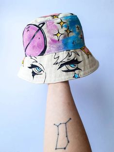 Space Girl Bucket Hat White Bucket Hat Handmade Handpainted - Etsy Whimsical Bucket Sun Hat, Adjustable Whimsical Bucket Hat, Whimsical Adjustable Bucket Hat, Whimsical Adjustable Bucket Sun Hat, Adjustable Whimsical Bucket Sun Hat, Handmade Whimsical Summer Bucket Hat, Artistic Bucket Hat For Beach, Artistic Adjustable Bucket Hat, Handmade Fun Wide Brim Bucket Hat