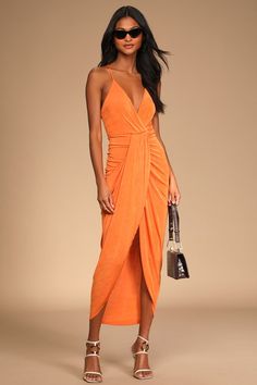 Show up fashionably late in the Lulus Dreamy Date Orange Surplice Midi Dress! Textured stretch knit, with a bit of sheen, shapes this must-have dress that falls from adjustable straps (that crisscross in back) into a surplice neckline and a lightly gathered bodice. A fitted waist tops a draping midi skirt that creates a stunning silhouette before ending at a tulip hem. Fit: This garment fits true to size. Length: Knee to mid-calf length. Size medium measures 46.5" from adjustable straps to hem. Honeymoon Fashion, Destination Wedding Guest Dress, Orange Bodycon Dress, Orange Midi Dress, Stretch Knit Dress, Fashionably Late, Lulus Dresses, Summer Wedding Outfits, Tulip Dress