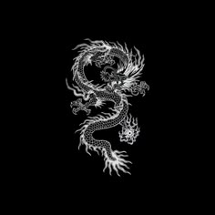 a black and white image of a dragon on the side of a dark wallpaper