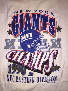 a t - shirt that says giants champs with a football helmet and stars on it