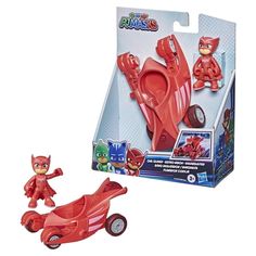 a red toy car and figure set in a box