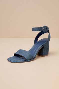 Nothing's easier than matching your favorite 'fits with the D'Amelio Footwear Imery Blue Jean Denim Ankle Strap High Heel Sandals! Woven denim fabric shapes these essential heels with a square footbed, a slender vamp strap, and a single sole silhouette. Wide straps sprout from the sides and wrap around the ankle to secure with a covered, circular buckle, all atop a chunky block heel. 3. 25" block heel. Cushioned insole. Rubber sole has nonskid markings. Man Made Materials. Imported. Lulus | Imer Square Toe Shoes, Ankle Strap High Heels, Lulu Fashion, Size 11 Heels, Sandal Heels, Blue Heels, Ankle Wrap, Chunky Block Heels, Dress Shoes Womens