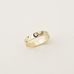 Simple and delicate, the Celestial Ring is beautiful and dainty on its own or stacked with another Eon or Era Ring to create your own personal stack to carry with you, at your fingers.✨ Every piece is handcrafted with love in Charleston, SC, using 90% recycled and 100% ethically sourced raw materials from the USA-- a simple way to help make our planet a better place. Includes gift-ready packaging with a recycled cotton card printed with compostable inks, recycled tissue, and a linen drawstring back printed with compostable inks! MATERIALS: * GF = 14k Gold Fill * SS = Sterling Silver DETAILS: 3.5mm Band Width AT CHECKOUT: * If you need your piece sooner than our standard production time, please select expedited shipping (and add a note with your ideal delivery date) and we will do our absol Moon And Stars Ring, Stars Ring, Planet Ring, Ring Moon, Celestial Ring, Moon And Star Ring, Celestial Wedding, Star Ring, Moon And Stars