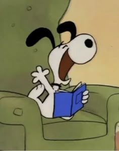 a cartoon dog is reading a book while sitting in a chair with its mouth open