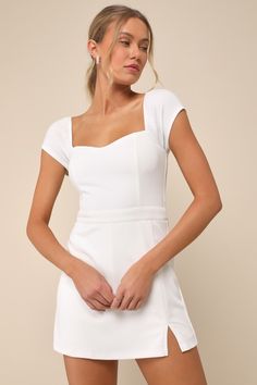 The easiest way to look instantly sensational is with a strappy pair of heels and the Lulus Remarkably Perfect White Short Sleeve Skort Romper! Look effortlessly sweet the moment you put on this stretchy crepe knit romper that features a flattering sweetheart neckline and a seamed bodice, framed by cute short sleeves (with elastic at the shoulders). The fitted waist sits atop a pair of flirty shorts with an overlay panel at the front that creates a trendy skort look! Hidden back zipper/clasp. Fi Wineries Outfit, Skort Romper, Casual Formal Dresses, White Skort, Knit Romper, Rehearsal Dinner Dresses, Lulu Fashion, Casual Wedding Dress, Short Sleeve Romper