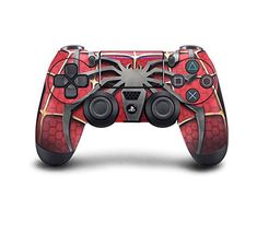 a red and black controller for a video game system with an intricate design on the side