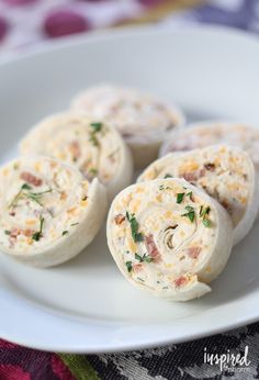 small appetizers on a white plate ready to be eaten