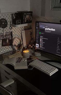 a desktop computer sitting on top of a desk next to a keyboard and monitor screen