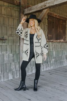 This Cream and Black Aztec Print Cardigan is a cozy yet stylish piece perfect for fall and winter! Long sleeves and an open front design for easy, effortless layering. Features a striking Aztec print in classic cream and black tones, adding a touch of boho flair. Ribbed detailing at the cuffs and hem provides a refined, finished look. Soft, comfortable fabric ensures all-day warmth and style. Layer this cardigan over a simple tee or blouse for an instant style upgrade, whether you're heading out Western Cardigan, Revival Clothing, Aztec Print Cardigan, Fall Style Guide, Aztec Cardigan, Gameday Dress, Black Tones, Loungewear Dresses, Casual White Dress