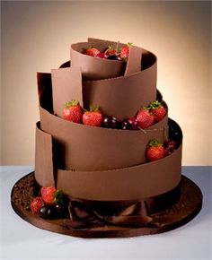 a cake made out of cardboard with strawberries on top