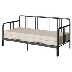 a black metal daybed with white mattresses on the bottom and side rails, against a white background