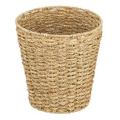 a large woven basket on a white background