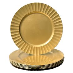 gold plates stacked on top of each other in the shape of a sunburst