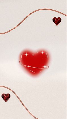 two hearts connected to one another on a white surface with red string and stars in the middle