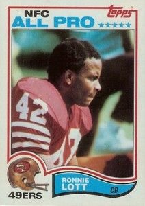 a football card with an image of ronnie lott on the front and back