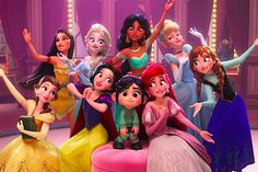 the disney princesses are posing for a group photo