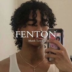 a man taking a selfie with his cell phone in front of him and the words fenton on it