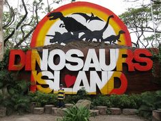 there is a sign that says dinosaurs island