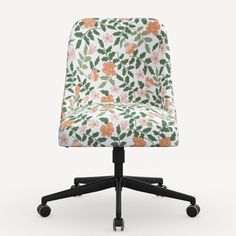 an office chair with flowers on the back and wheels, in front of a white background