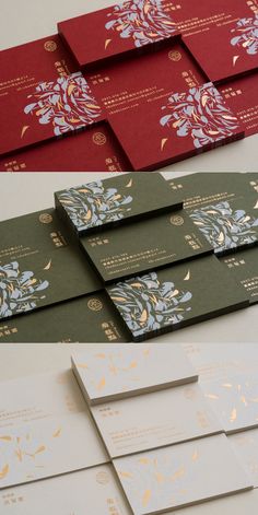 several different types of cards and envelopes with gold foil on them, all in various colors