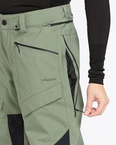 Blend in or stand out in our new V.CO AT Stretch Gore-Tex pant. Thanks to this “do-it-all” pant, we believe those wet weather winters or sweaty slushy spring days just got drier and more comfortable. Outfitted in our loose straight fitting Gore-Tex 2-Layer Stretch Recycled Poly + PFCec Free fabric, complimented by inner leg and hip vents, and Zip Tech® jacket-to-pant interface. Waterproof/Breathability Rating: GORE-TEX Guaranteed to Keep You Dry™ GORE-TEX Guaranteed to Keep You Dry™ Waterproof/Breathability Rating: GORE-TEX Guaranteed to Keep You Dry™ GORE-TEX Recycled Stretch 2-Layer Poly + PFCec Free, V-Science Breathable Lining System, Fully Taped Seams, Relaxed Fit, Mid Rise Zip Tech® Pant to Jacket Interface YKK® AquaGuard® Water Repellent Exposed Zippers Fine Mesh Lined Zippered Vent Tech Jacket, Wet Weather, Exposed Zipper, Free Fabric, Gore Tex, Water Repellent, Mid Rise, Relaxed Fit, Pants