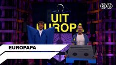 two men standing on stage in front of a purple and black background with the words utt europe