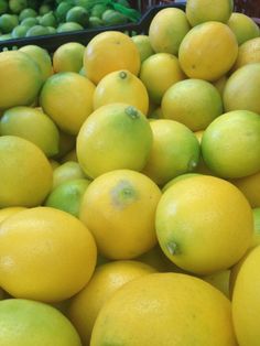 a pile of lemons sitting next to each other