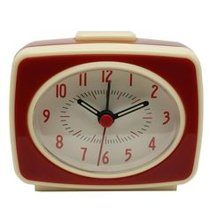 a red and white alarm clock with numbers on it's face is shown in front of a white background