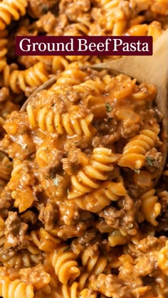 ground beef pasta in a skillet with a wooden spoon and text overlay that reads ground beef pasta