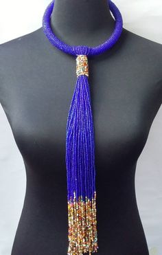 African beaded necklace made with the royal blue beads. Its a perfect accessory that will match most of your outfits. Suitable for any season. A good gift to your friends and loved ones. Blue Long Necklace For Party, Party Necklaces With Colorful Blue Beads, Elegant Royal Blue Beaded Necklaces With Round Beads, Blue Necklaces With Colorful Beads For Party, Elegant Royal Blue Beaded Necklace With Round Beads, Elegant Long Blue Beaded Necklace, Elegant Blue Large Beads, Blue Round Beads Necklaces For Party, Blue Beaded Chain Necklace For Party