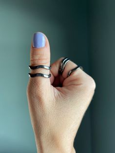 Inspire yourself to reach your goals with wearing this wavy Hematite Crystal ring! This black shiny band ring is made from pure stone & won't turn your finger green.  These trendy and well-known rings are believed to absorb negative energy and break when they absorb too much! You can wear these rings 24/7 and they are waterproof.  Hematite is a grounding crystal that can help remove negative energy in any space. Resting directly on your body, Hematite will absorb any negative energy around itself and its wearer, and work to purify the chakras. This Hematite crystal is a grounding stone that also possesses protective qualities, especially for psychic protection. Other benefits may include: ~ Balancing Polarities ~ Manifestation ~ Action ~ Mental Enhancement ~ Channeling & Grounding Higher V Remove Negative Energy, Aries And Aquarius, Hematite Ring, Hematite Crystal, Psychic Protection, Wave Ring, Les Chakras, Crystal Ring, Mens Birthday Gifts