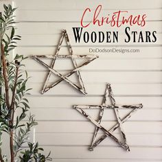 christmas wooden stars are hanging on the wall