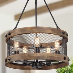 a wooden chandelier hanging from the ceiling