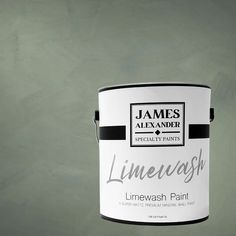 a white paint can with the words limewash painted on it in black and white