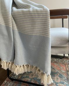 a blanket on a chair in a room