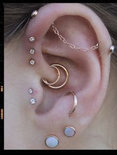 three different types of ear piercings