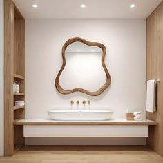 a white sink sitting under a mirror in a bathroom next to a shelf with towels