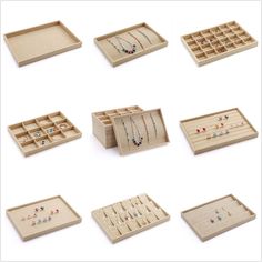 a collection of wooden jewelry boxes with necklaces and rings in them on white background