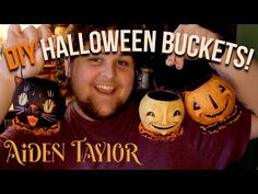 a man holding three pumpkins in front of his face with the words diy halloween buckets