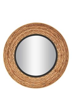 an oval mirror made out of wicker with black trimmings on the edge