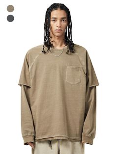 It is a casual oversized long sleeves t-shirt that has short sleeves layered look using patched sleeves. Made of pigment dyed fabric, the t-shirt has vintage and stylish vibe.- Oversized fit- Ribbed neck- Bias tape on the neck- Track stitch- Distressed hem Washed Long Sleeve Relaxed Fit T-shirt, Washed Crew Neck T-shirt For Layering, Acid Wash Washed Tops For Fall, Vintage Crew Neck Tops For Layering, Oversized Washed T-shirt For Fall, Faded Oversized Crew Neck Top, Oversized Faded Crew Neck Top, Distressed Long Sleeve T-shirt For Streetwear, Washed Cotton Long Sleeve T-shirt