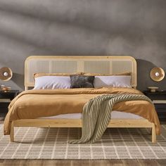 a large bed sitting on top of a wooden floor