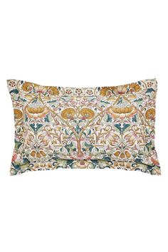 a rectangular pillow with an ornate design on it