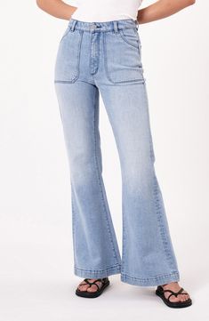 A faded finish dials up the old-favorite appeal of these impeccably flared light-wash jeans. 32" inseam; 25" leg opening; 11 1/2" front rise; 14 1/2" back rise (size 29) Zip fly with button closure Front scoop pockets; back patch pockets 99% cotton, 1% elastane Machine wash, line dry Imported Fall Light Wash Full Length Flare Jeans, Faded Fall Flare Jeans, Fall Faded Flare Jeans, Faded Flare Jeans With Five Pockets, Fitted Washed Flare Jeans, Faded Flare Full Length Jeans For Spring, Faded Full Length Flare Jeans For Spring, Spring Retro Denim Flares, Spring Faded Full-length Flare Jeans