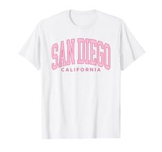 PRICES MAY VARY. Vintage San Diego Preppy Varsity retro throwback classic California t-shirt. Add this San Diego California outfit to your vacation beachwear collection. Preppy Varsity aesthetic, surf, sunshine souvenir t-shirt for boys & girls. Retro vintage San Diego CA family vacation souvenir apparel in a Preppy Varsity retro throwback style with Pink Arched Text graphic. Great trendy mens shirt design and cute womens tops and kids surf clothing, for trips to San Diego. Lightweight, Classic Varsity Aesthetic, Preppy Kids Outfits, Preppy Kids, La Jolla California, California Outfits, Surf Clothing, Beachwear Collection, Text Graphic, Surf Outfit