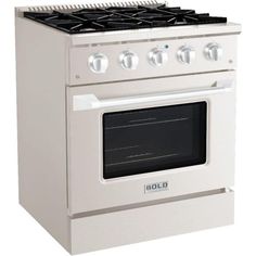 a white stove top oven sitting next to a wall mounted oven with two burners