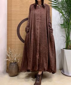 【Fabric】 linen Lining  cotton 【Color】 Brown, peacock blue, purple 【Size】  Shoulder width is not limited Shoulder + Sleeve Length 68cm / 26" Bust 130cm / 50" Length 123cm / 47" Washing & Care instructions: -Hand wash or gently machine washable do not tumble dry -Gentle wash cycle (40oC) -If you feel like ironing (although should not be necessary) , do it with steam or while the dress is still slightly wet -Do not bleach If you like this dress, perhaps you will also like other dresses from our col Relaxed Fit A-line Maxi Dress For Fall, Bohemian Dresses With Pockets, Long Cotton Maxi Dress For Fall, Cotton Long Maxi Dress For Fall, Solid Color Bohemian Linen Dress, Bohemian Linen Dress Solid Color, Bohemian Long Sleeve Solid Maxi Dress, Solid Color Bohemian Long Sleeve Maxi Dress, Brown Linen Long Sleeve Dress