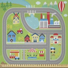 a road map with houses, cars and trucks on it in the middle of a green field